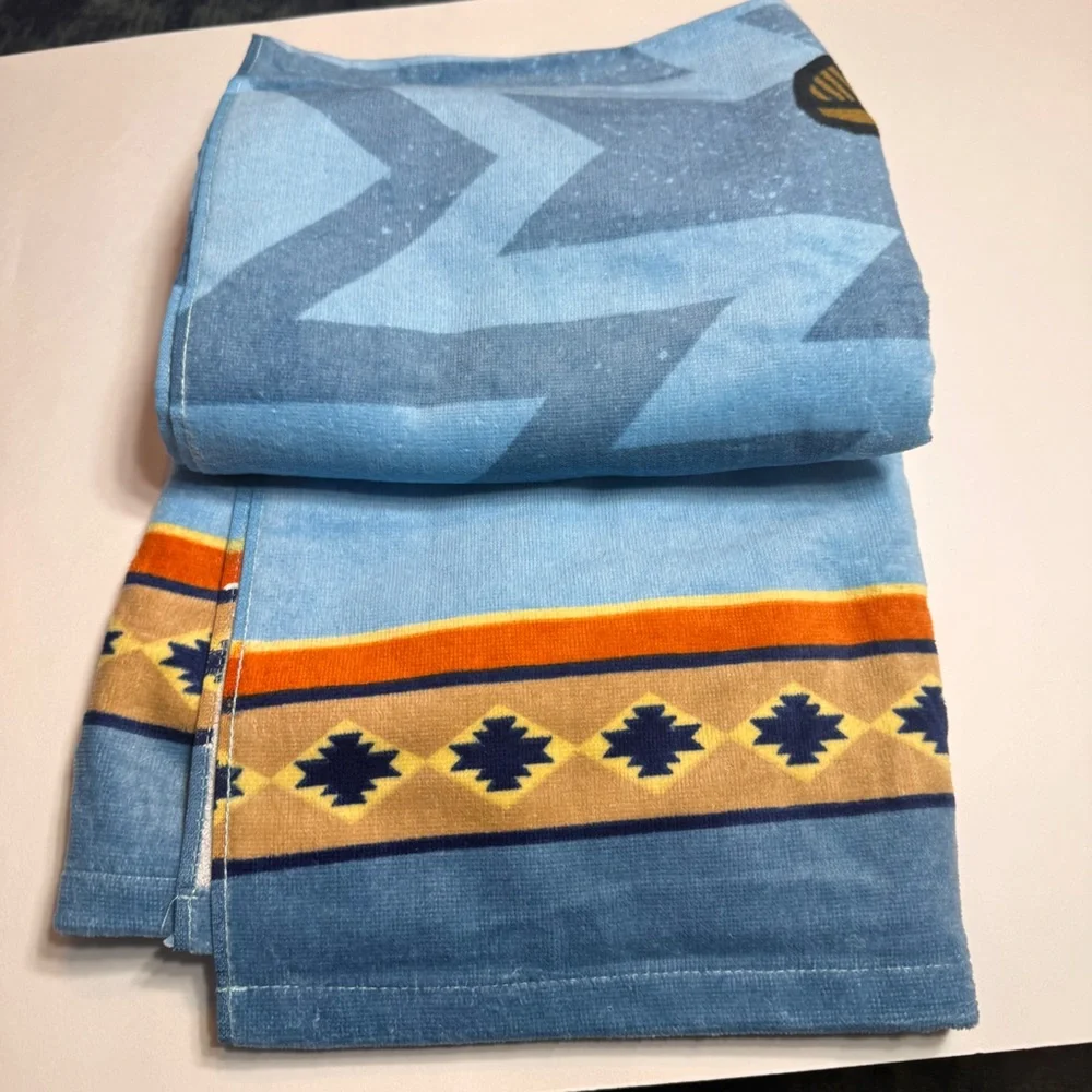 Disney Beach Towel Wilderness Lodge Resort Totem Pole with Blue background